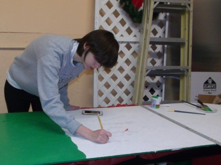 Alexa an AmeriCorps Volunteer helping with murals for Golden Rule