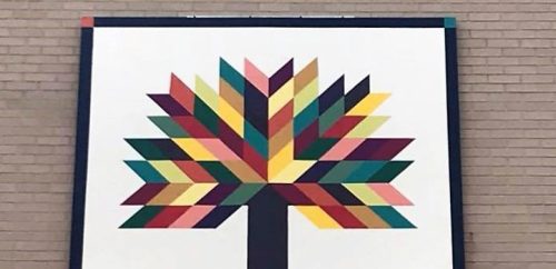 Tree of Life Quilt Block on the side of Citizens Bank in Elkins WV