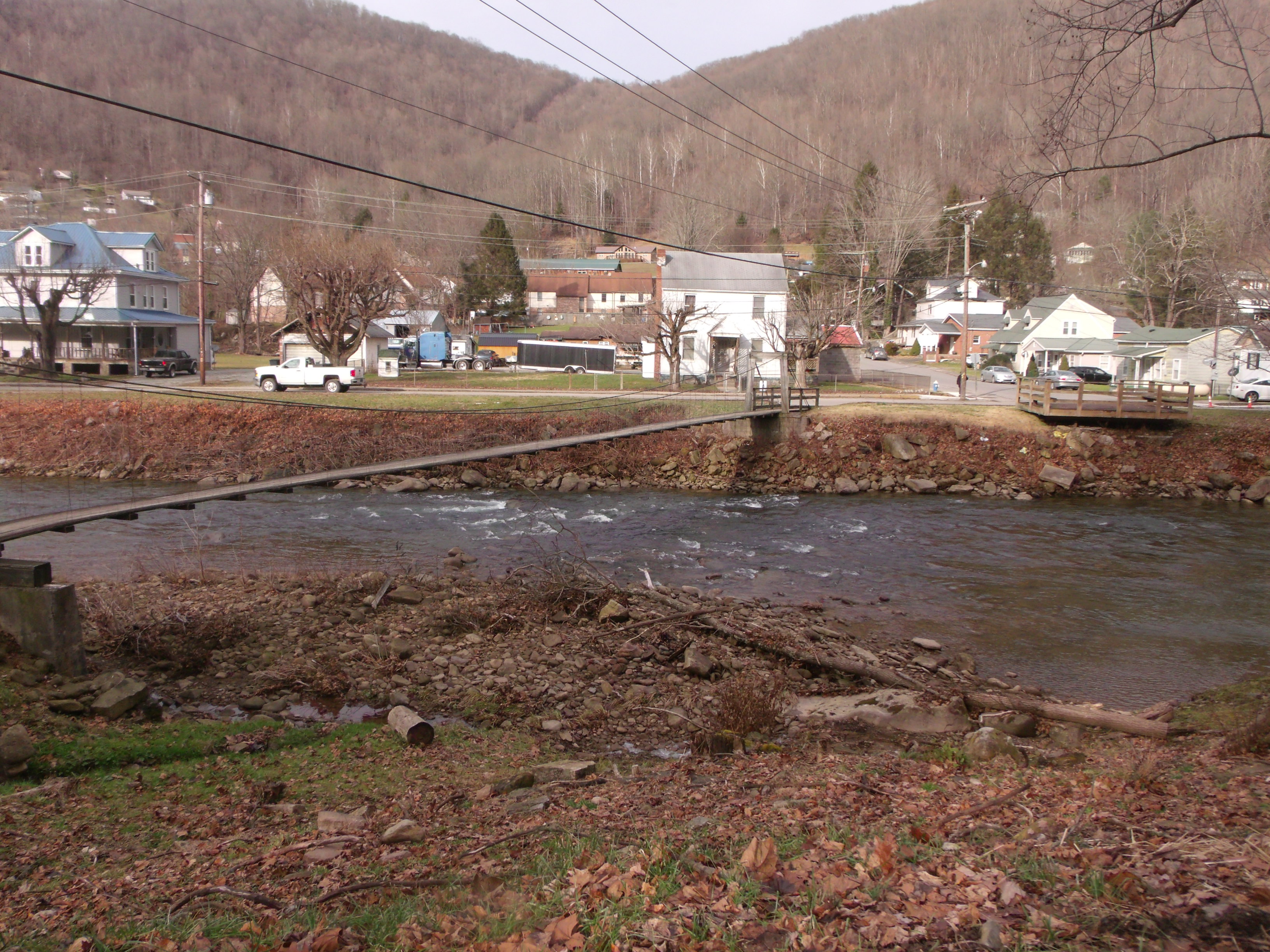 view looking back at town and 1st swinging bridge along Lover's Lane Board Walk