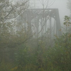 Iron train bridge in foggy Lewis County West Virginia